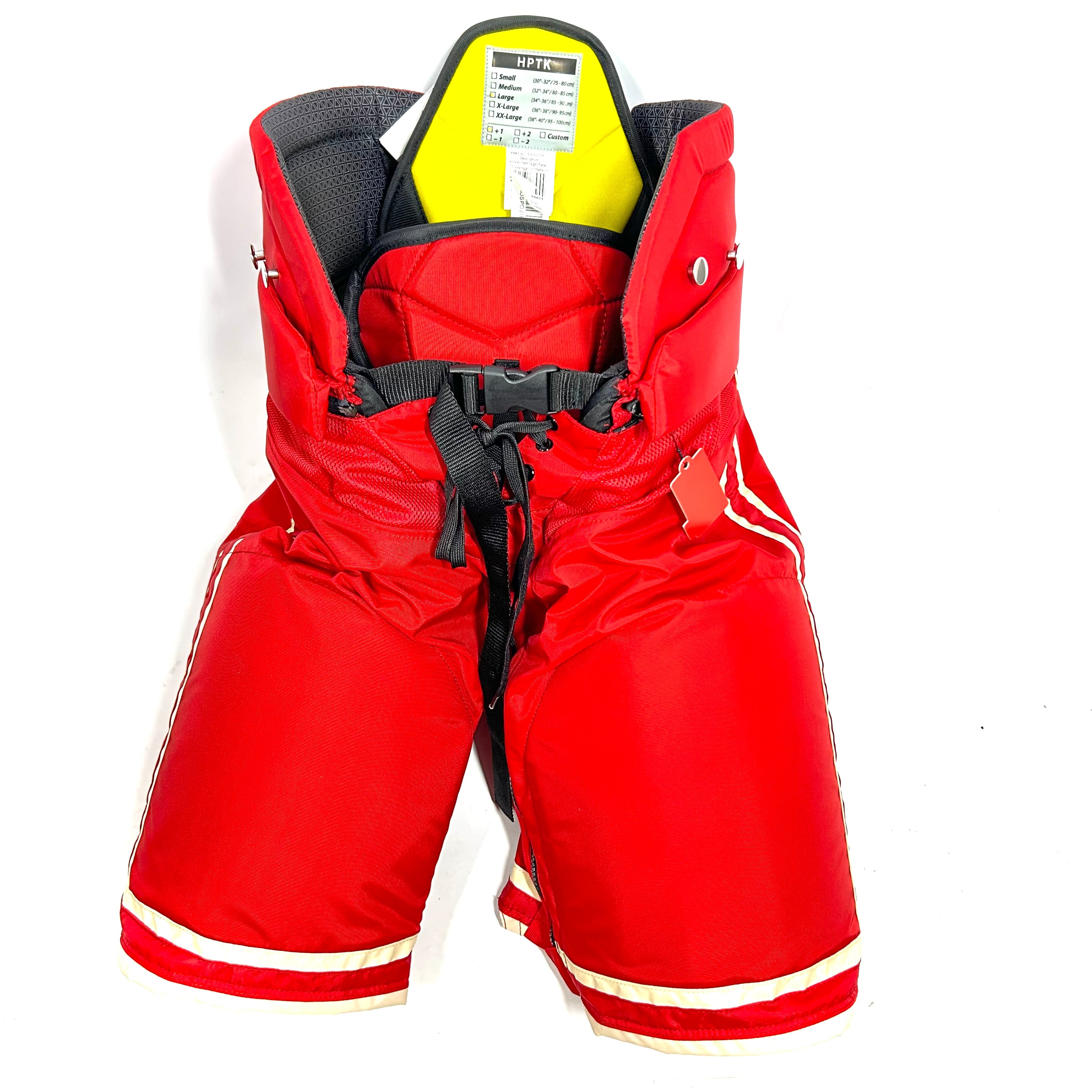 CCM HPTK - Pantalon de hockey professionnel NHL - Flames de Calgary (rouge/blanc)